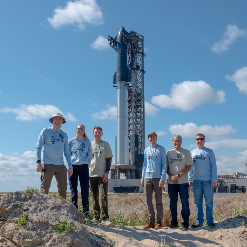 Acoustics research group in front of Starship